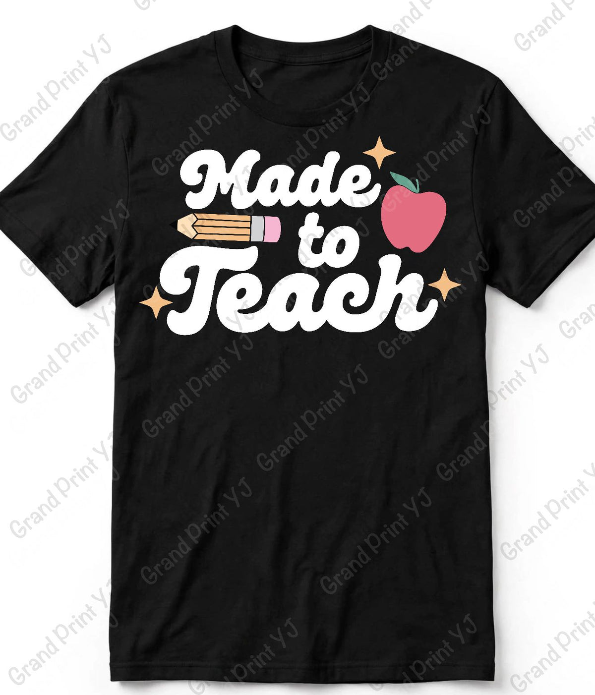 A black short-sleeve crewneck t-shirt with a 'Made to Teach' graphic on the chest. The graphic features white cursive text, a pink apple with a green stem, a yellow pencil, and small gold stars.