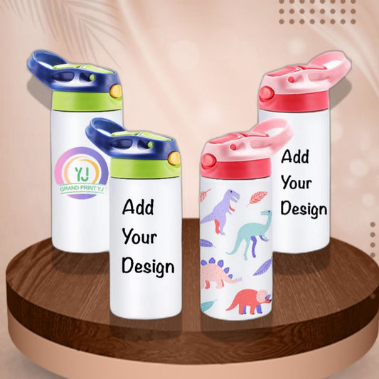Four children's water bottles with colorful lids on a wooden surface.